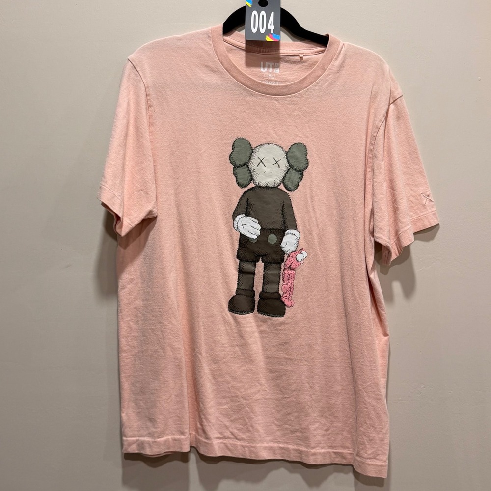 #4 Uniqlo KAWS Graphic Tee unisex Size M 22"‎ PTP Pink Short Sleeve Cotton Shirt